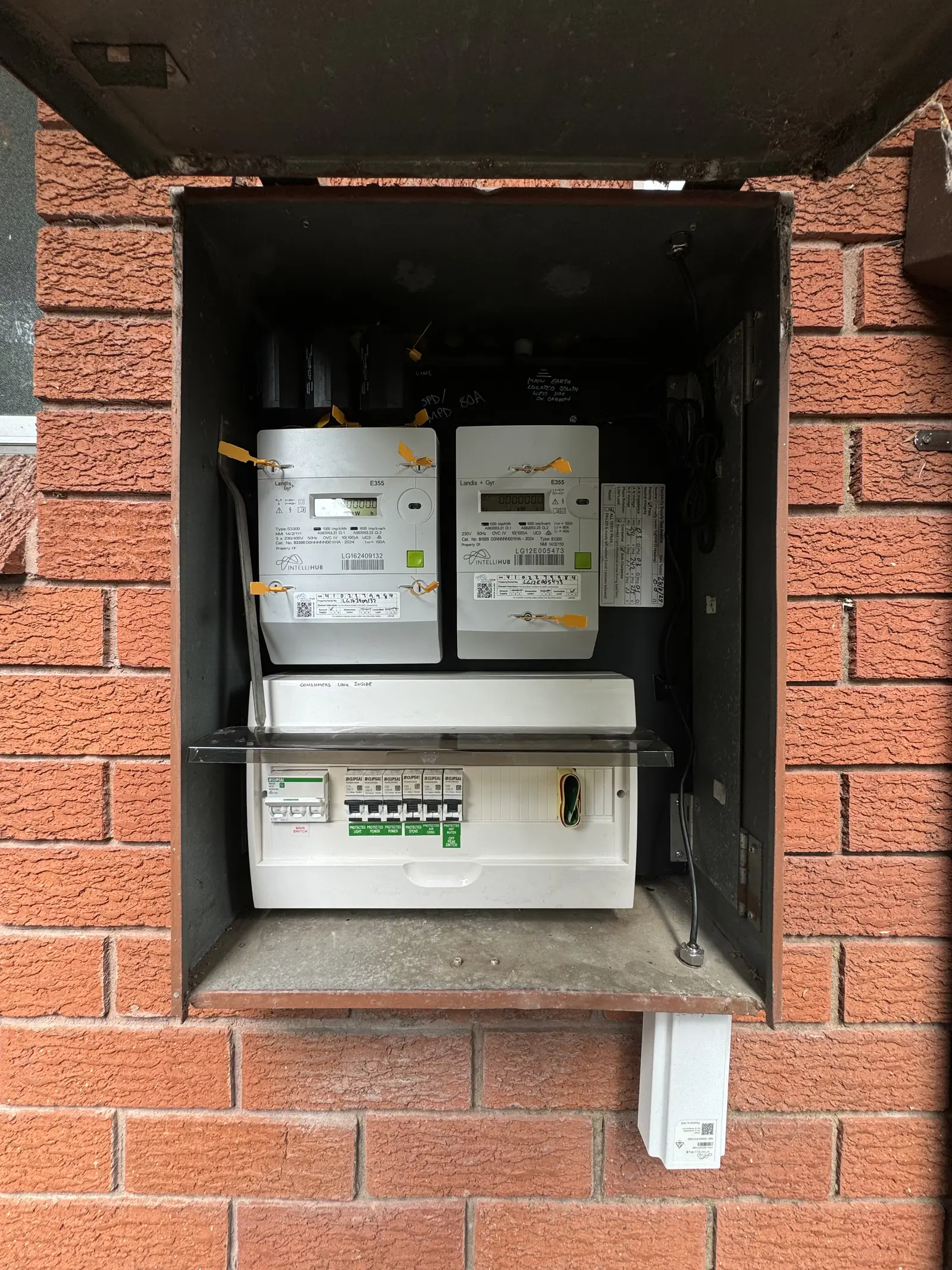 Licensed electrician working on a switchboard